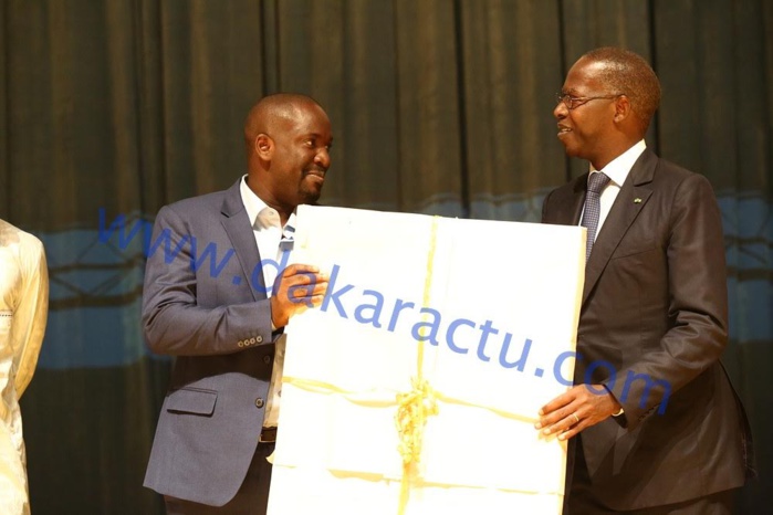 COLLABORATION : Le groupe IAM honore le Directeur de publication de DAKARACTU