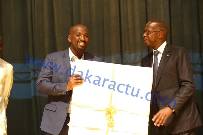 COLLABORATION : Le groupe IAM honore le Directeur de publication de DAKARACTU