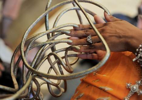 Dans le livre des records, avec des ongles d'un total de six mètres  (PHOTOS)