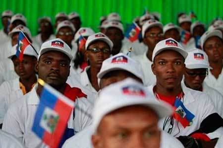 Un ministre haïtien au chevet des étudiants haïtiens de Me Wade