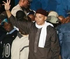 Karim Wade accueilli en héros à son domicile par les responsables du PDS