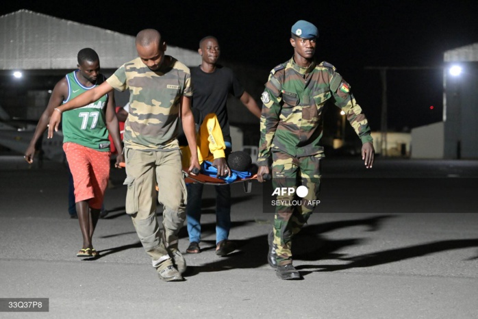 Arrêt sur image: Des migrants rapatriés de Dakhla foulent le tarmac de l’aéroport militaire de Yoff Arrêt sur image: Des migrants rapatriés de Dakhla foulent le tarmac de l’aéroport militaire de Yoff
