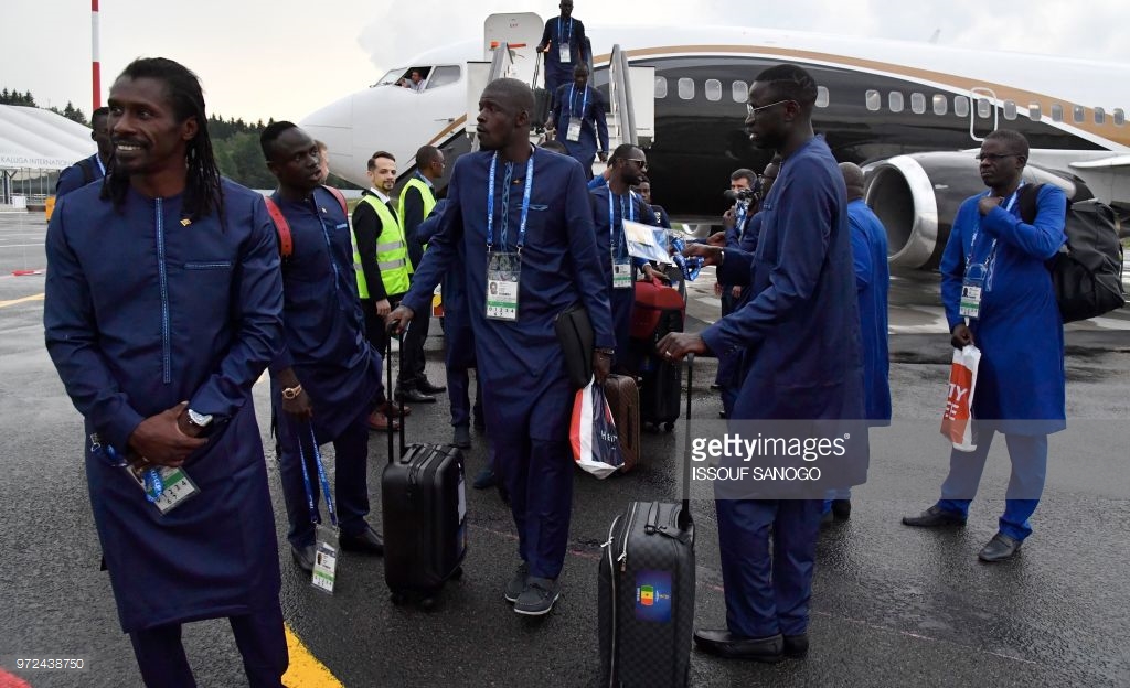 Coupe du monde : Les Lions arrivés à l'aéroport de Kaluga sous la pluie, en boubou "Obasanjo"