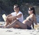 PHOTOS Carla Bruni très enceinte en bikini