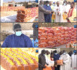 Aide alimentaire à Touba / Serigne Bassirou Mbacké Khadim Awa Bâ empile sacs de riz et aligne bidons d'huile.