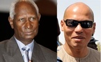 Quand le président Abdou Diouf donne un coup de main à Karim Wade.