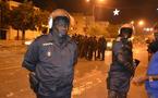 Le commissaire central entrain de fumer en pleine manifestation