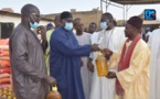 (IMAGES À TOUBA) Serigne Bassirou  Mbacké Khadim Awa Bâ offre des vivres aux populations et à Touba Ça Kanam