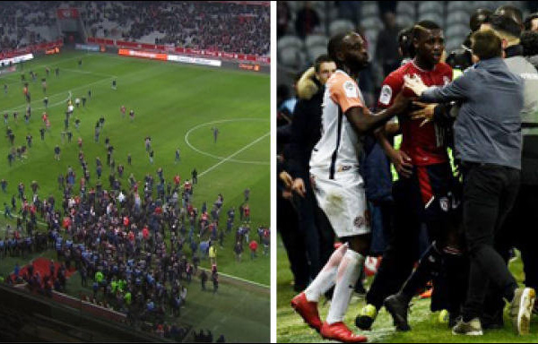 Lille : La pelouse envahie par des supporters qui s'en sont pris aux joueurs
