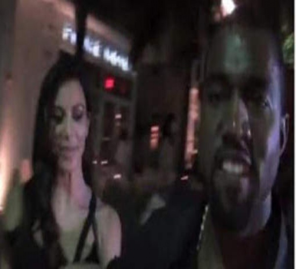 Kanye West agresse un paparazzi pour protéger Kim (VIDEO)